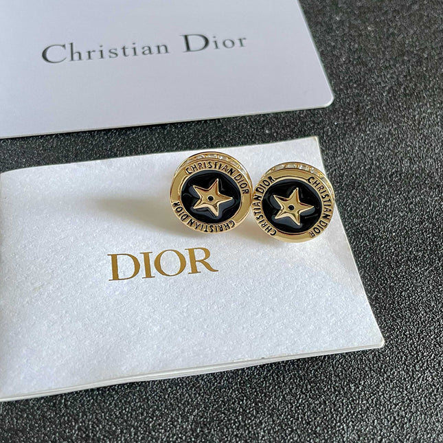 CD 26S STAR MEDALLION LOGO STUD EARRINGS IN BLACK ENAMEL & GOLD TONE METAL 631813