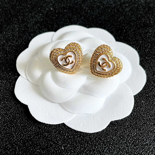 CHANEL 26S DOUBLE C LOGO PAVE HEART STUD EARRINGS WITH WHITE ENAMEL IN GOLD METAL 631815