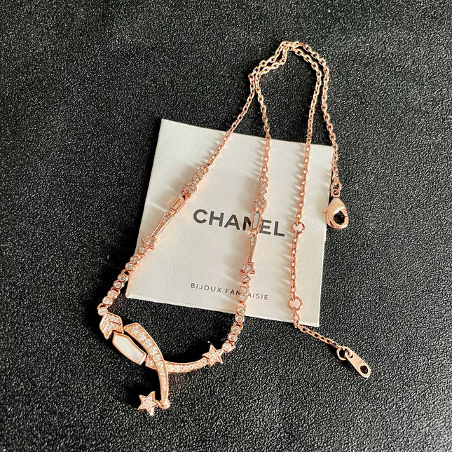 CHANEL 26S CRYSTAL STAR CHARM NECKLACE IN ROSE GOLD METAL 631898
