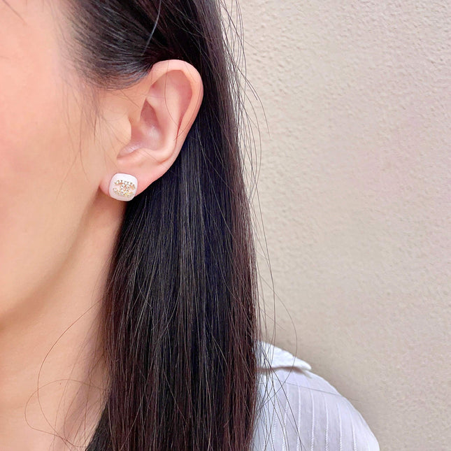 CHANEL 26S CHANEL CC LOGO PAVE CRYSTAL STUD EARRINGS IN WHITE ENAMEL WITH GOLD METAL 633309