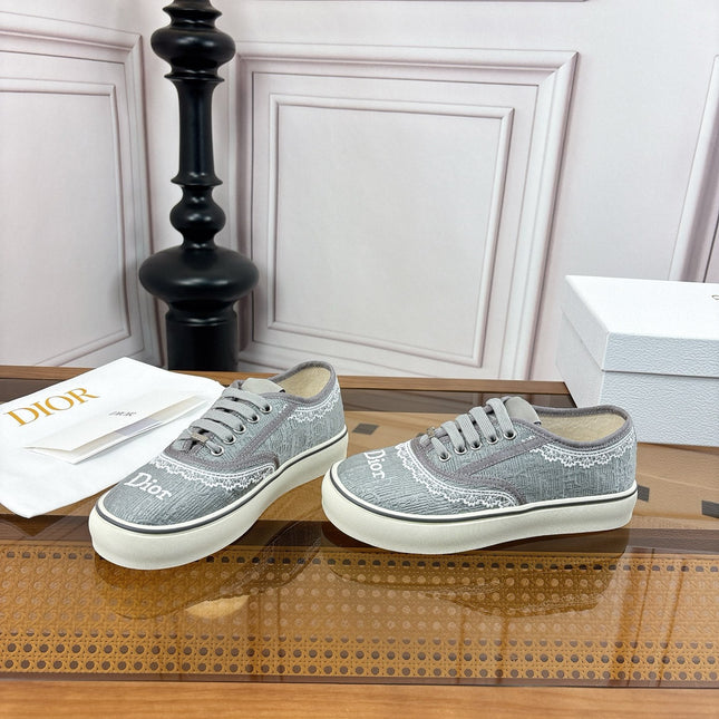 DIOR 26S LOW TOP SNEAKERS IN GREY CANVAS WITH WHITE LACE TRIM & LOGO PRINT