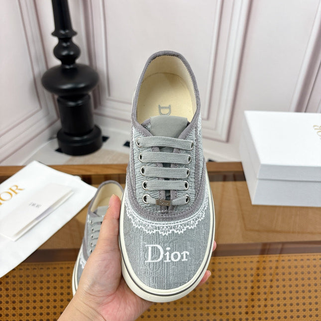 DIOR 26S LOW TOP SNEAKERS IN GREY CANVAS WITH WHITE LACE TRIM & LOGO PRINT