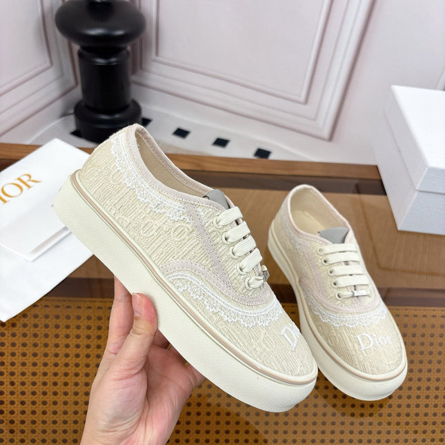 DIOR 26S LOW TOP SNEAKERS IN BEIGE CANVAS WITH WHITE LACE TRIM & LOGO PRINT