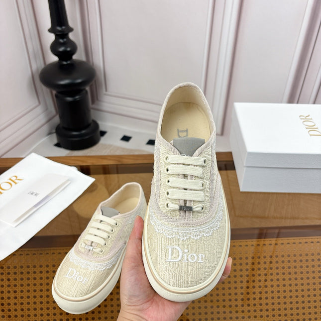 DIOR 26S LOW TOP SNEAKERS IN BEIGE CANVAS WITH WHITE LACE TRIM & LOGO PRINT