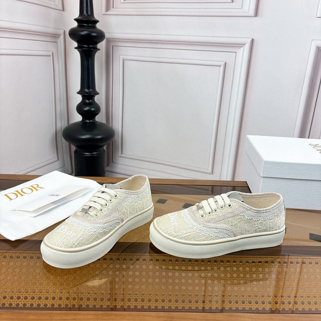 DIOR 26S LOW TOP SNEAKERS IN BEIGE CANVAS WITH WHITE LACE TRIM & LOGO PRINT