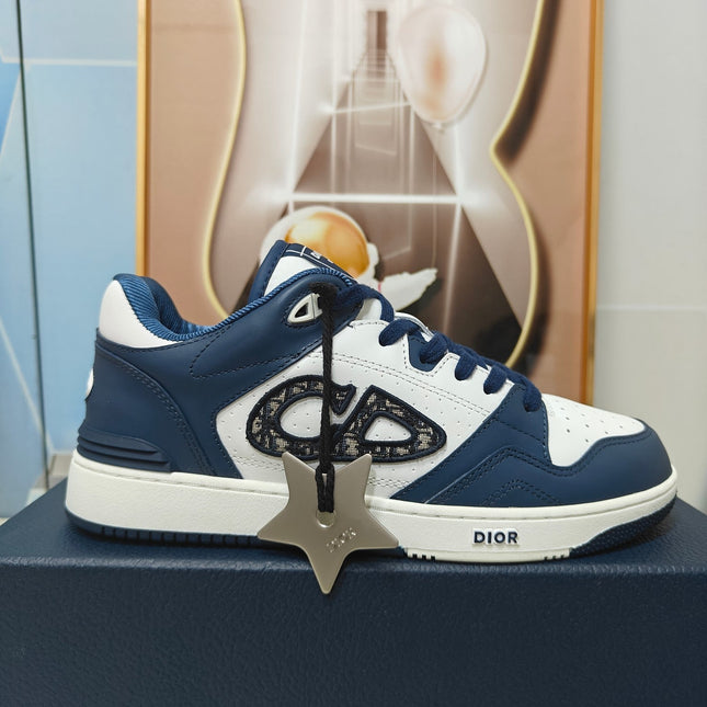 DIOR 26S LOW-TOP SNEAKER IN WHITE AND NAVY BLUE CALFSKIN
