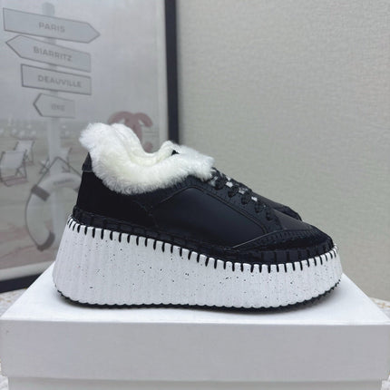 CHLOÉ 26S WEDGE SOLE SNEAKERS IN BLACK CALFSKIN