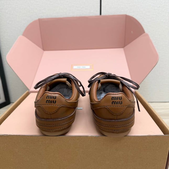 MIUMIU 26S BUCKLE SNEAKERS IN BROWN CALFSKIN WITH GOLD HARDWARE