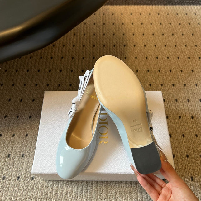 DIOR 26S HIGH HEELS 80 MM IN LIGHT BLUE PATENT CALFSKIN WITH RIBBON BOW