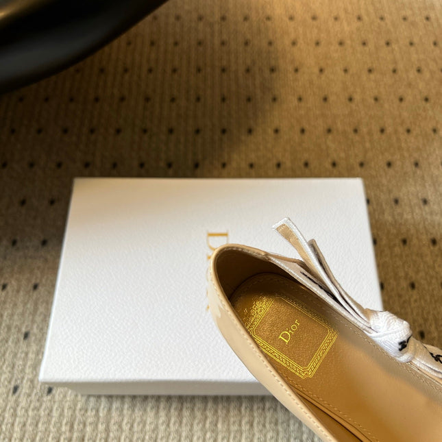 DIOR 26S HIGH HEELS 80 MM IN BEIGE PATENT CALFSKIN WITH RIBBON BOW