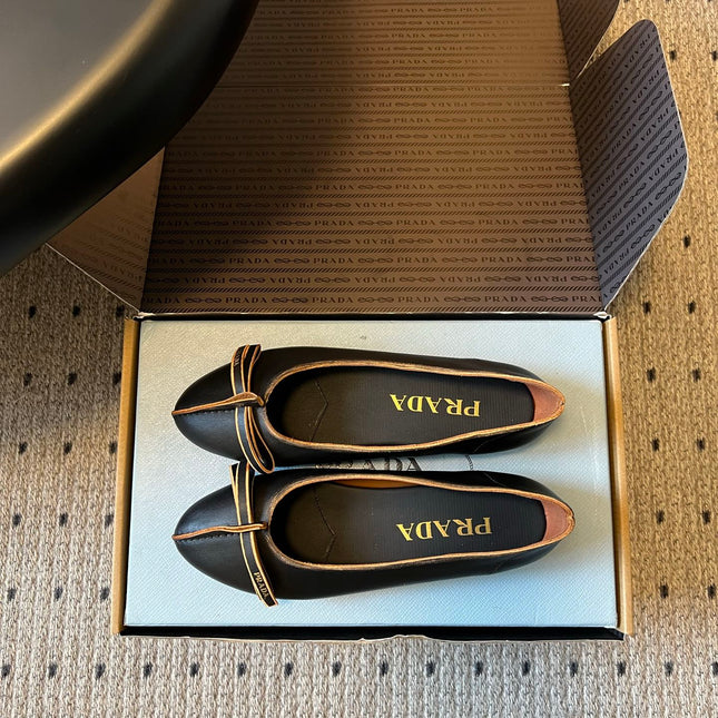 PRADA 26S POINTED TOE BOW FLATS IN BLACK CALFSKIN