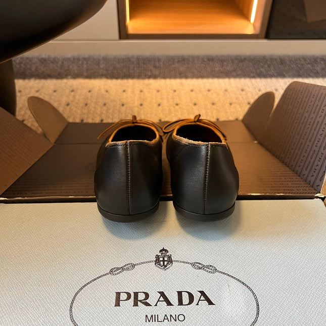 PRADA 26S POINTED TOE BOW FLATS IN BLACK CALFSKIN
