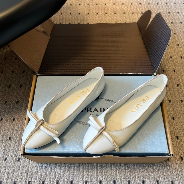 PRADA 26S POINTED TOE BOW FLATS IN IVORY WHITE CALFSKIN