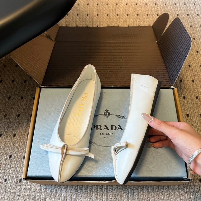 PRADA 26S POINTED TOE BOW FLATS IN IVORY WHITE CALFSKIN