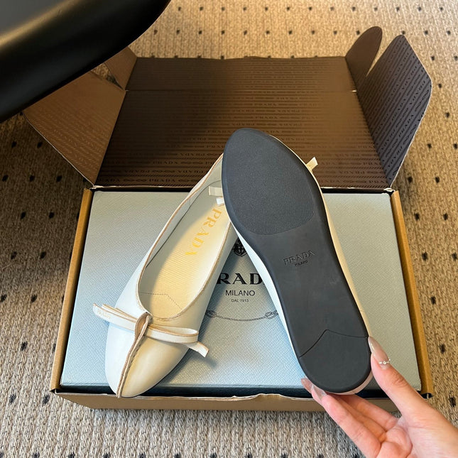 PRADA 26S POINTED TOE BOW FLATS IN IVORY WHITE CALFSKIN