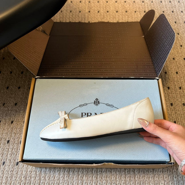 PRADA 26S POINTED TOE BOW FLATS IN IVORY WHITE CALFSKIN