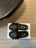 DIOR 26S SLIDES IN BLACK CALFSKIN WITH BOW