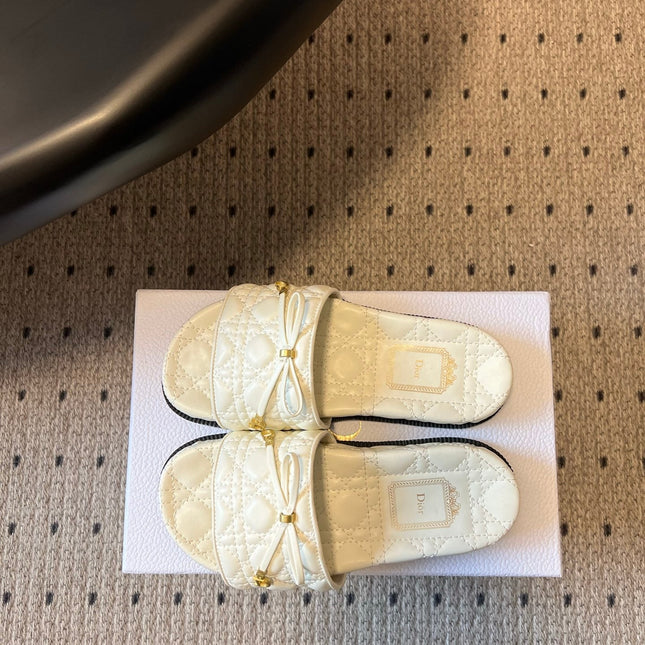 DIOR 26S SLIDES IN WHITE CALFSKIN WITH BOW