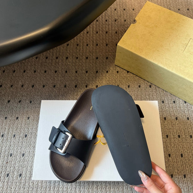 THE ROW 26S BUCKLE SLIDE SANDALS IN BLACK CALFSKIN