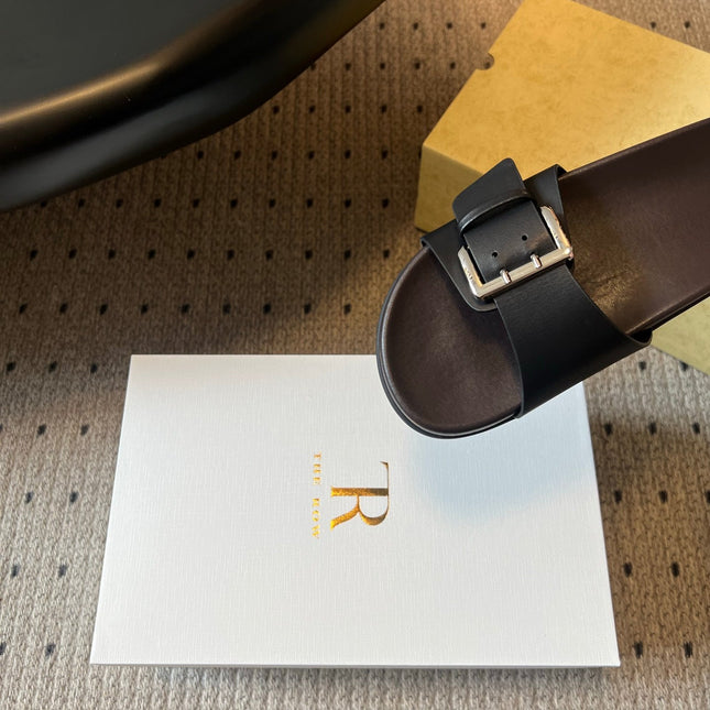 THE ROW 26S BUCKLE SLIDE SANDALS IN BLACK CALFSKIN