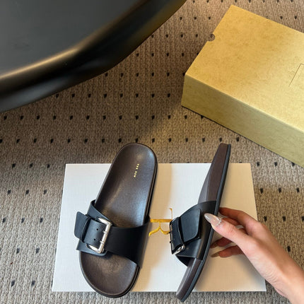 THE ROW 26S BUCKLE SLIDE SANDALS IN BLACK CALFSKIN