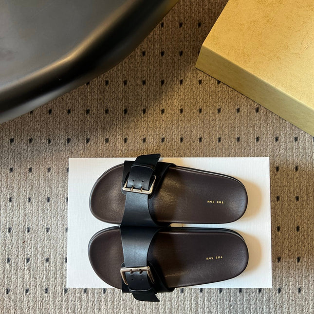 THE ROW 26S BUCKLE SLIDE SANDALS IN BLACK CALFSKIN