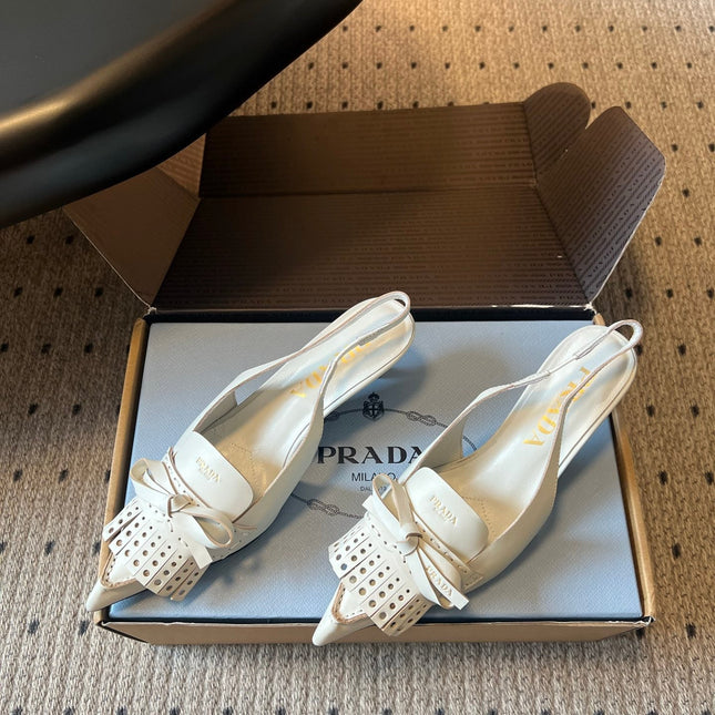 PRADA 26S POINTED TOE FRINGE BOW SLINGBACK PUMPS 55MM IN IVORY WHITE CALFSKIN