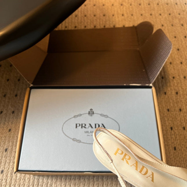 PRADA 26S POINTED TOE FRINGE BOW SLINGBACK PUMPS 55MM IN IVORY WHITE CALFSKIN