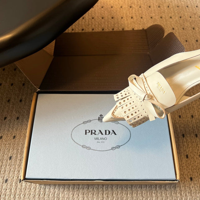 PRADA 26S POINTED TOE FRINGE BOW SLINGBACK PUMPS 55MM IN IVORY WHITE CALFSKIN