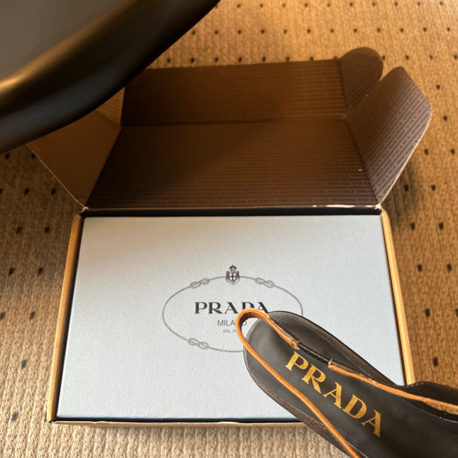 PRADA 26S POINTED TOE FRINGE BOW SLINGBACK PUMPS 55MM IN BLACK CALFSKIN