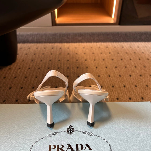 PRADA 26S BOW DETAIL SLINGBACK PUMPS 55MM IN WHITE PATENT CALFSKIN