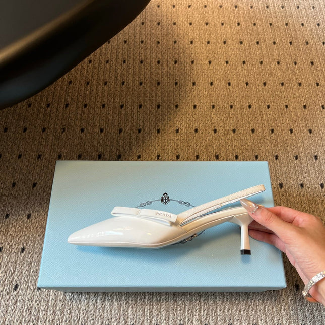 PRADA 26S BOW DETAIL SLINGBACK PUMPS 55MM IN WHITE PATENT CALFSKIN