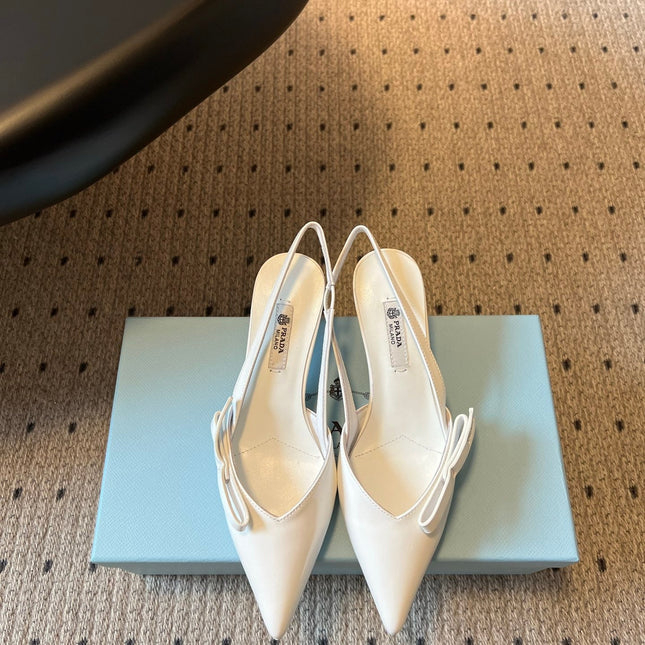 PRADA 26S BOW DETAIL SLINGBACK PUMPS 55MM IN WHITE PATENT CALFSKIN