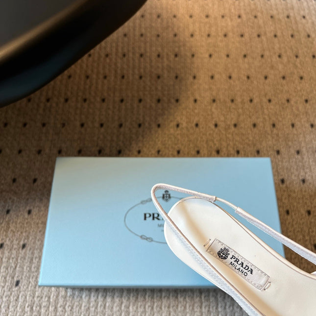 PRADA 26S BOW DETAIL SLINGBACK PUMPS 55MM IN WHITE PATENT CALFSKIN