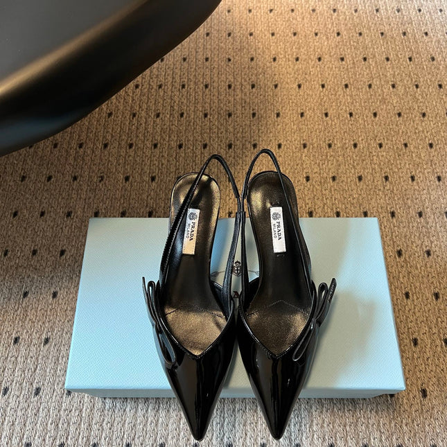 PRADA 26S BOW DETAIL SLINGBACK PUMPS 55MM IN BLACK PATENT CALFSKIN