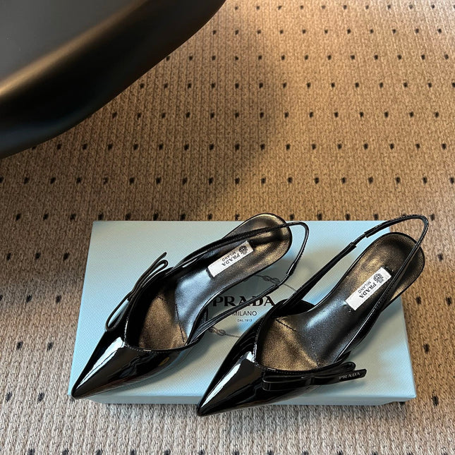 PRADA 26S BOW DETAIL SLINGBACK PUMPS 55MM IN BLACK PATENT CALFSKIN