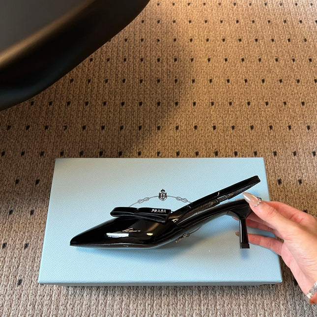 PRADA 26S BOW DETAIL SLINGBACK PUMPS 55MM IN BLACK PATENT CALFSKIN