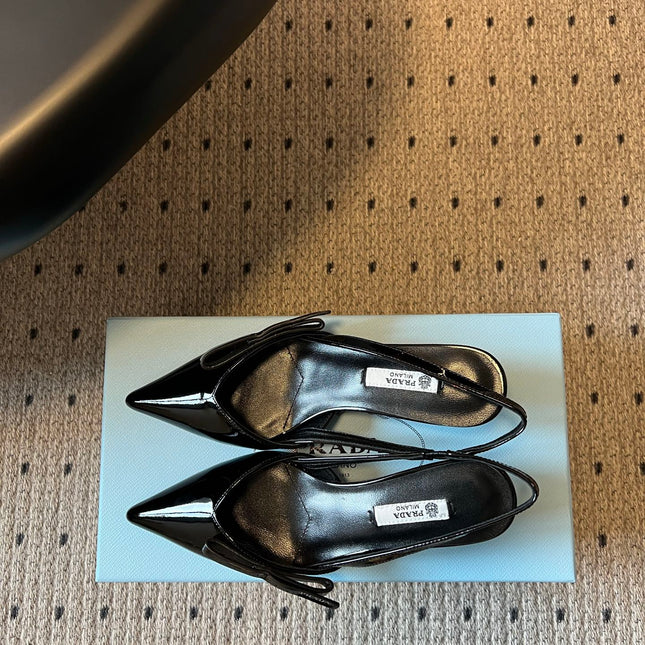 PRADA 26S BOW DETAIL SLINGBACK PUMPS 55MM IN BLACK PATENT CALFSKIN