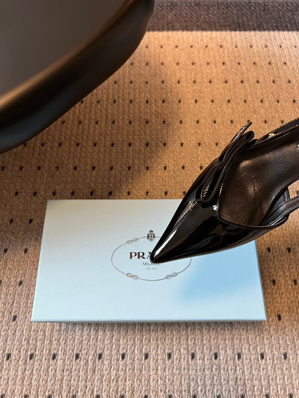PRADA 26S BOW DETAIL SLINGBACK PUMPS 55MM IN BLACK PATENT CALFSKIN
