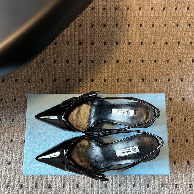 PRADA 26S BOW DETAIL SLINGBACK PUMPS 75MM IN BLACK PATENT CALFSKIN