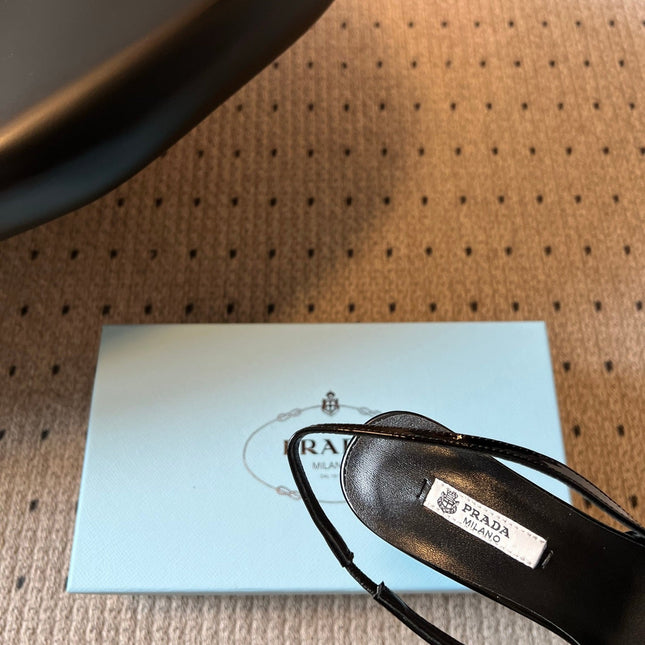 PRADA 26S BOW DETAIL SLINGBACK PUMPS 75MM IN BLACK PATENT CALFSKIN
