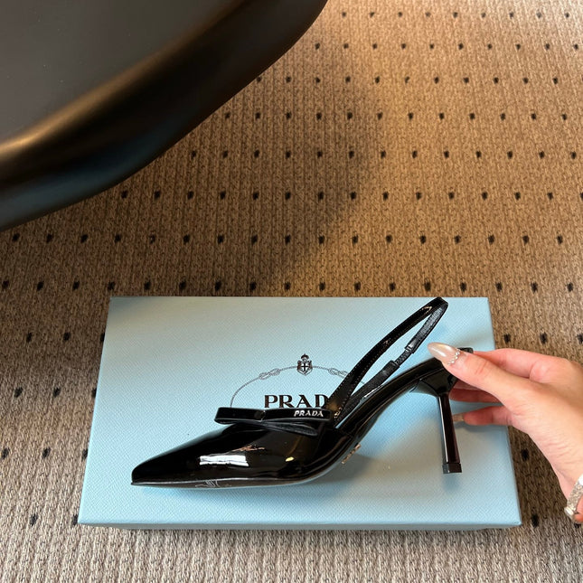 PRADA 26S BOW DETAIL SLINGBACK PUMPS 75MM IN BLACK PATENT CALFSKIN