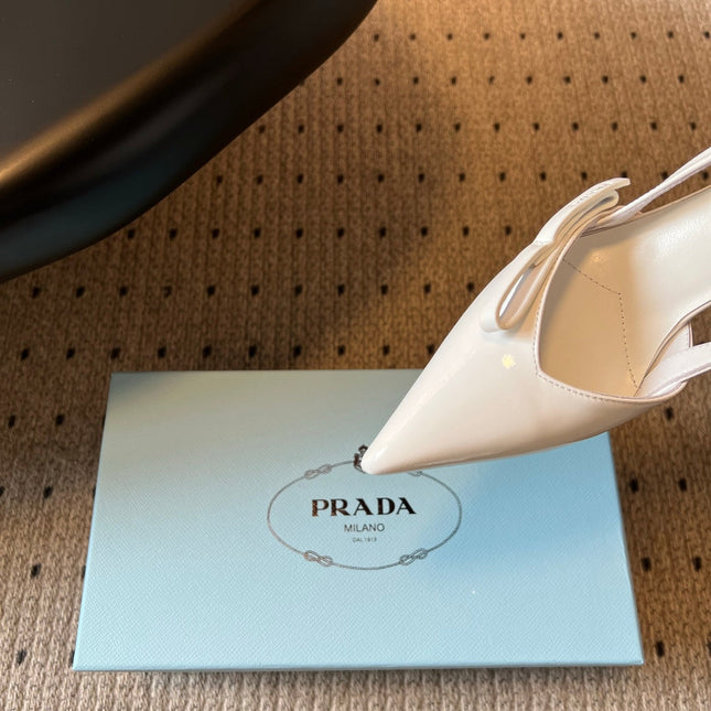 PRADA 26S BOW DETAIL SLINGBACK PUMPS 75MM IN WHITE PATENT CALFSKIN