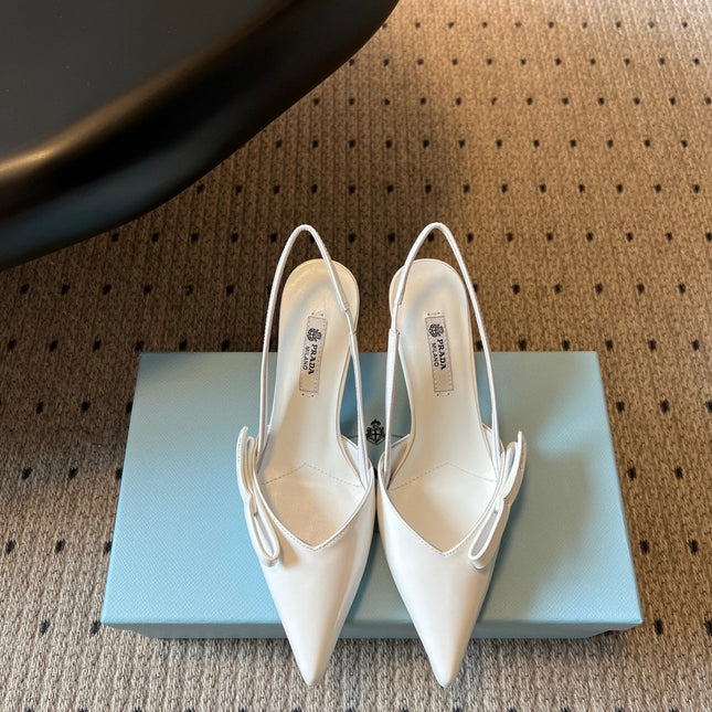 PRADA 26S BOW DETAIL SLINGBACK PUMPS 75MM IN WHITE PATENT CALFSKIN