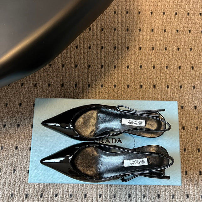 PRADA 26S POINTED TOE SLINGBACK HEELS 55MM IN BLACK PATENT CALFSKIN