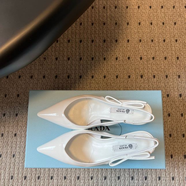 PRADA 26S POINTED TOE SLINGBACK HEELS 55MM IN WHITE PATENT CALFSKIN