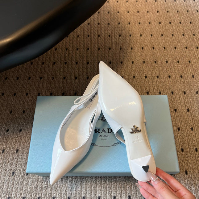 PRADA 26S POINTED TOE SLINGBACK HEELS 55MM IN WHITE PATENT CALFSKIN