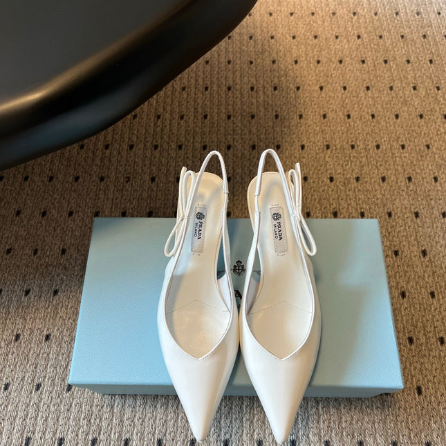 PRADA 26S POINTED TOE SLINGBACK HEELS 55MM IN WHITE PATENT CALFSKIN