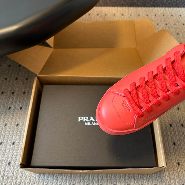 PRADA 26S LACE UP SNEAKERS 40MM IN RED CALFSKIN