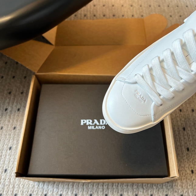 PRADA 26S LACE UP SNEAKERS 40MM IN WHITE CALFSKIN